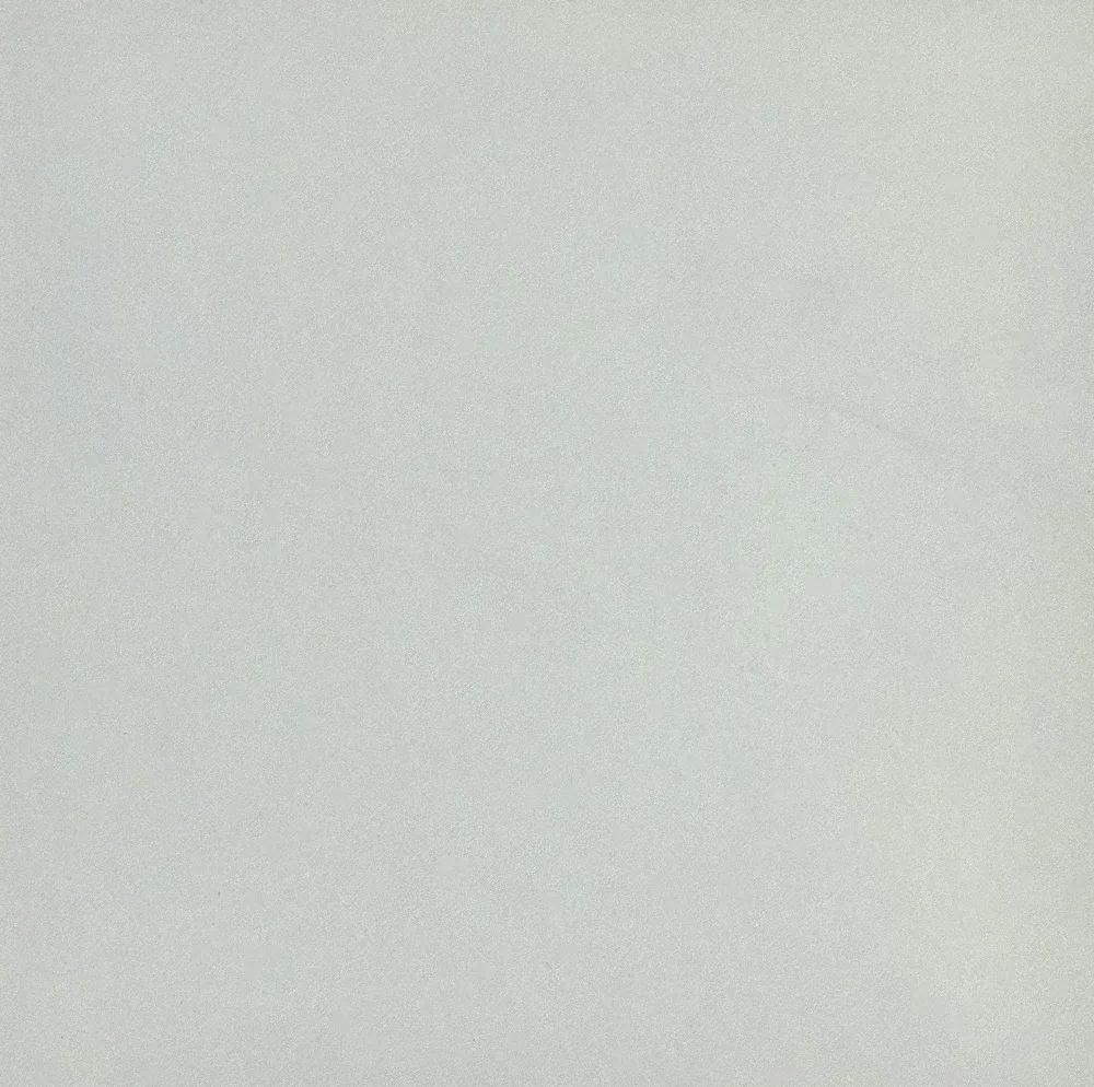Pale, textured, off-white surface.