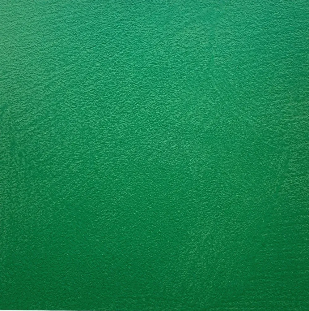 Solid green textured surface with a subtle gradient.
