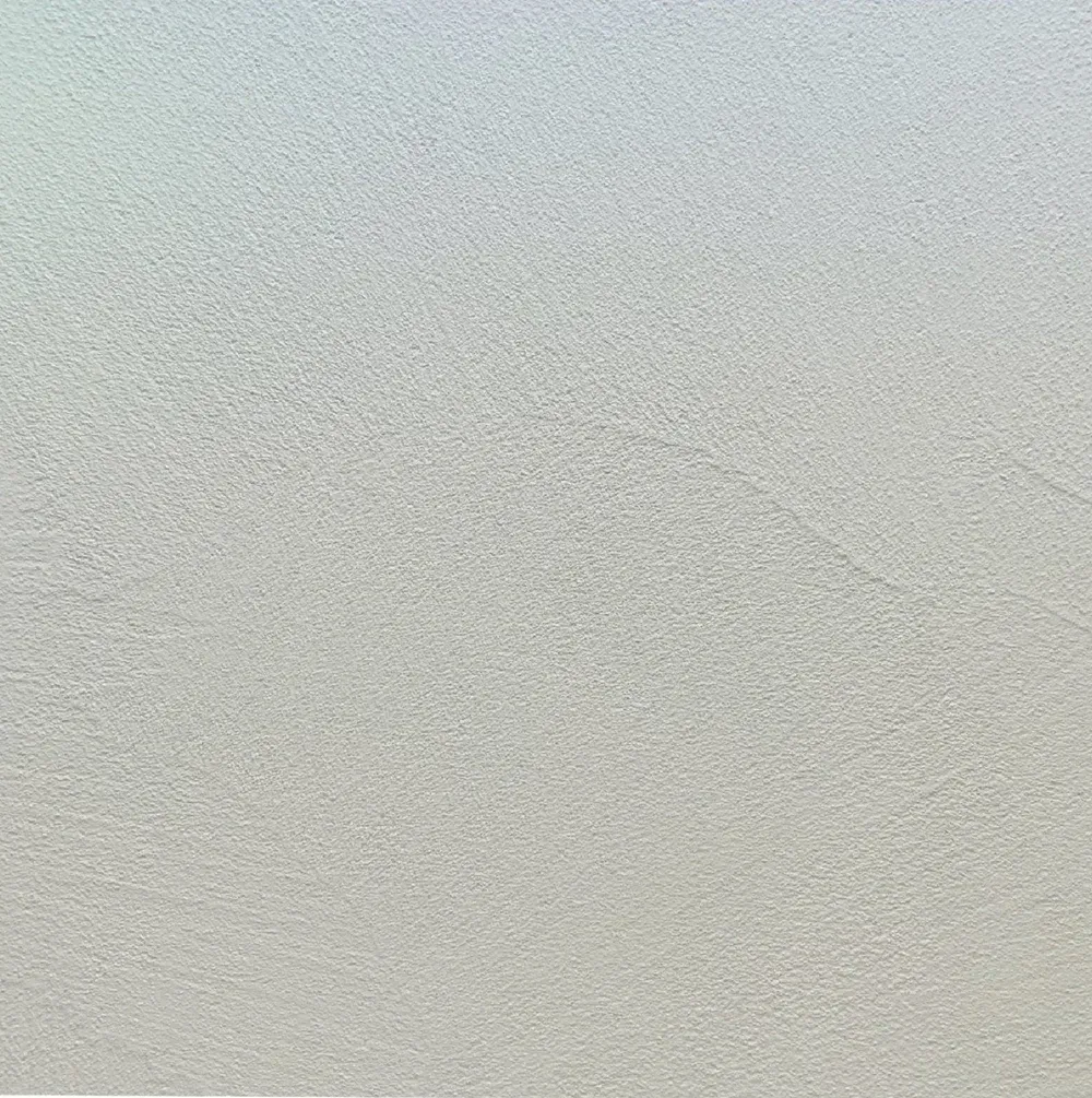 Textured gray and white background with horizontal streaks.