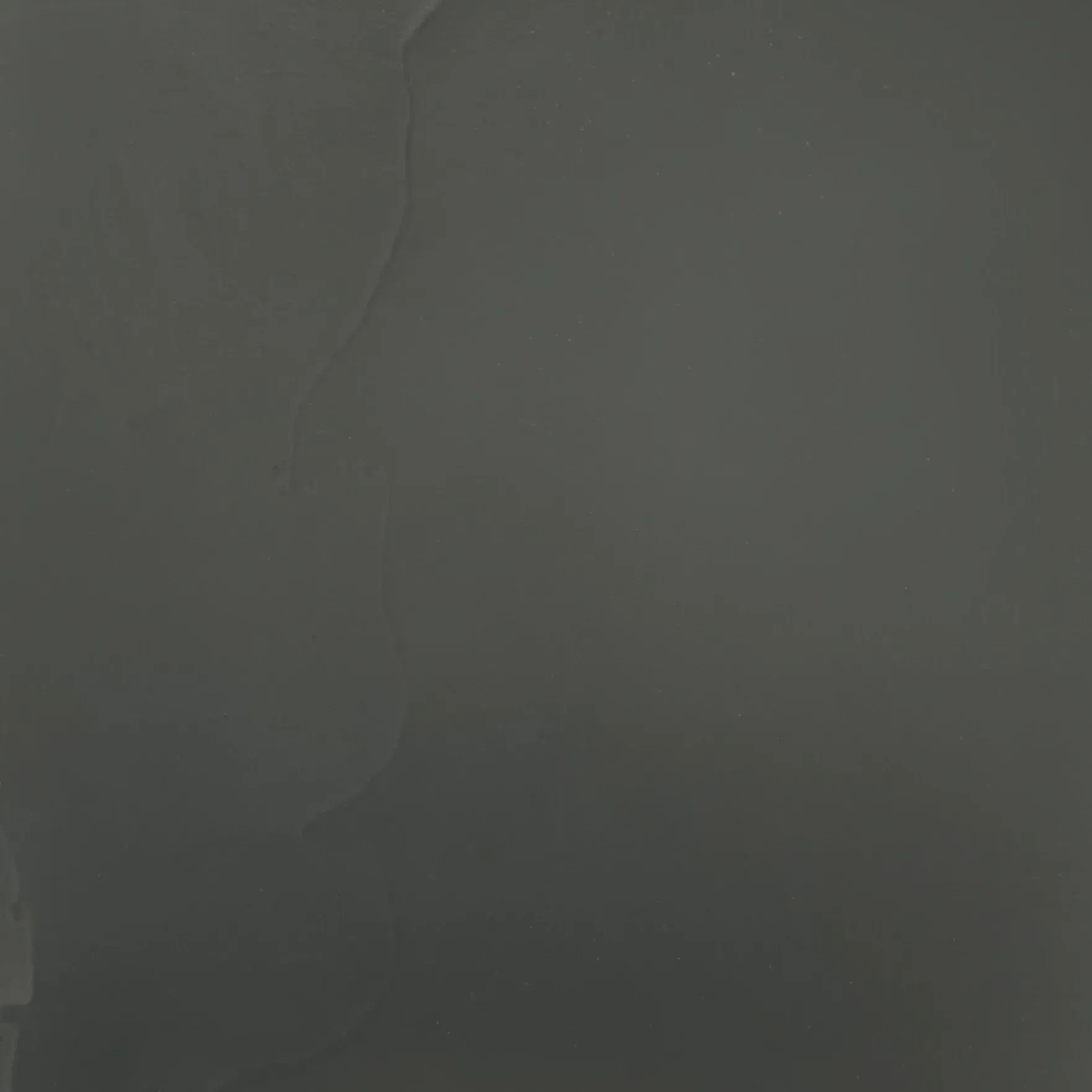 Solid gray background with a crease.