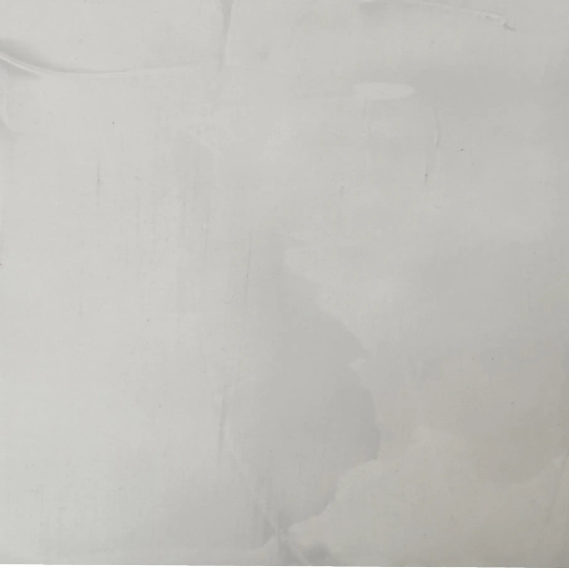 Light gray background with subtle textured variations.