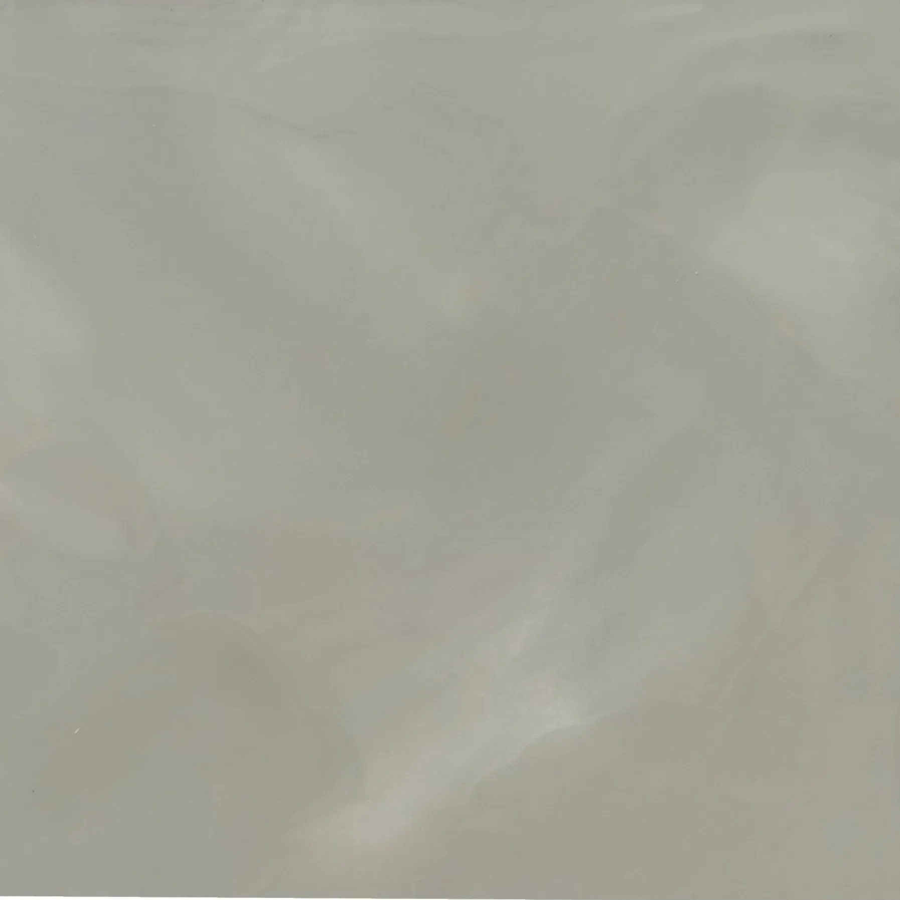 Gray, textured surface with subtle highlights and shadows.