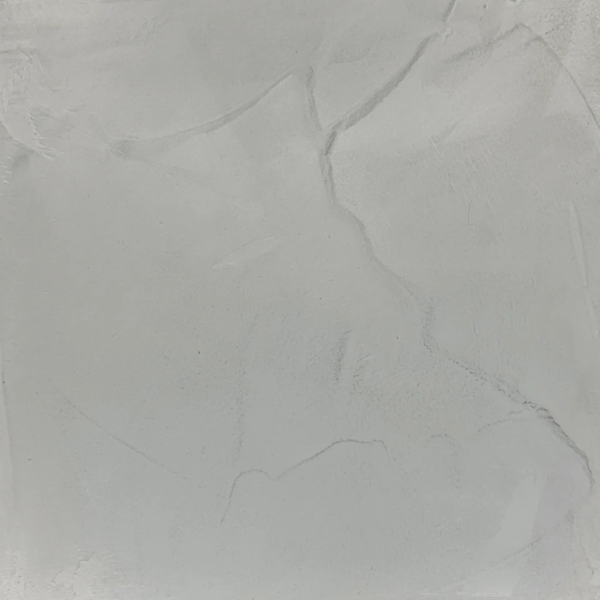 Light gray tile with subtle veining.
