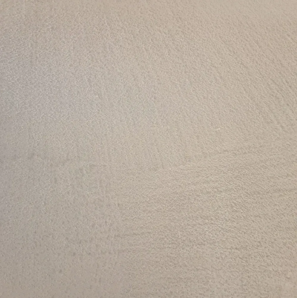 Light beige, textured surface.