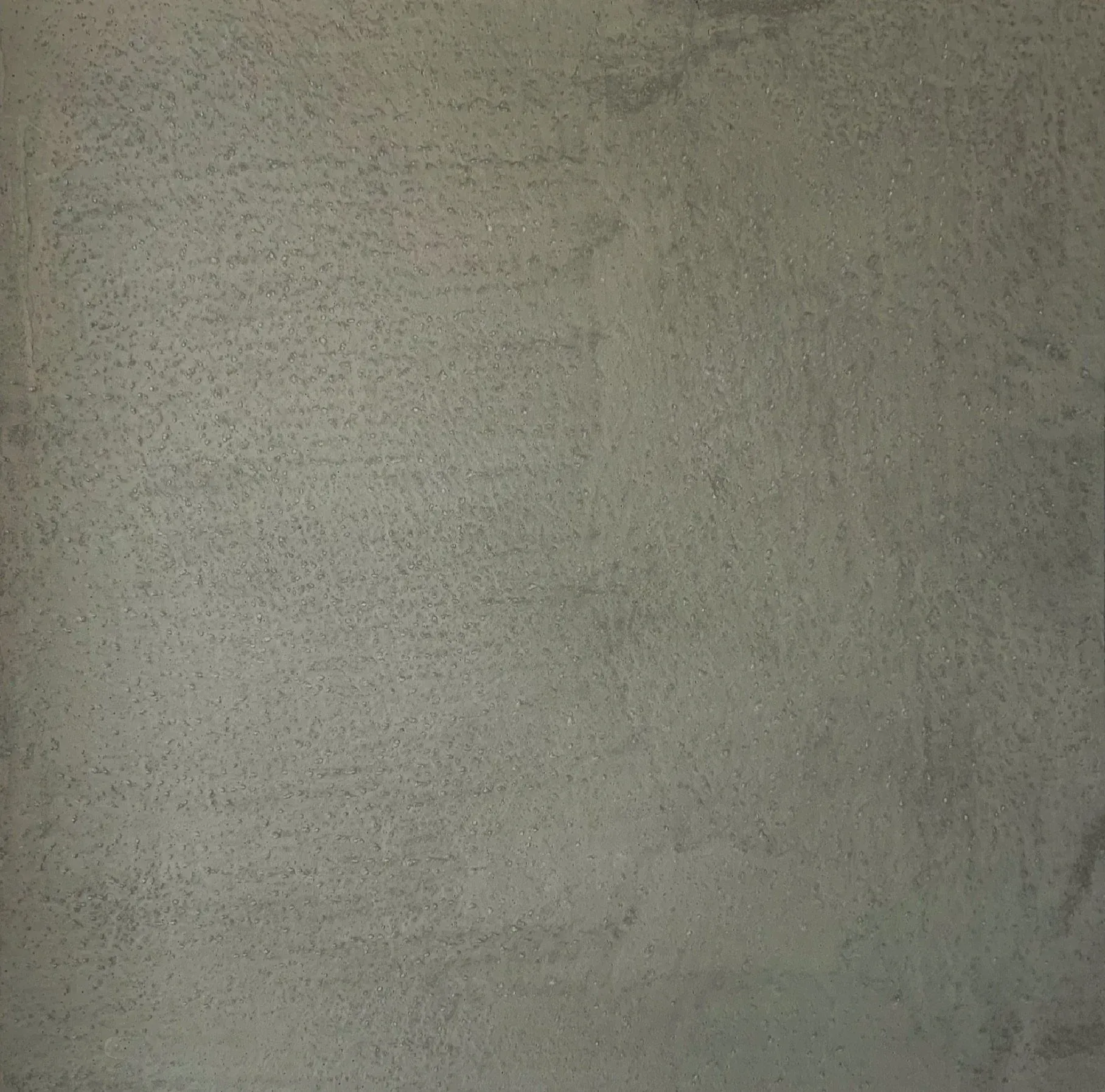 Gray, textured concrete surface.