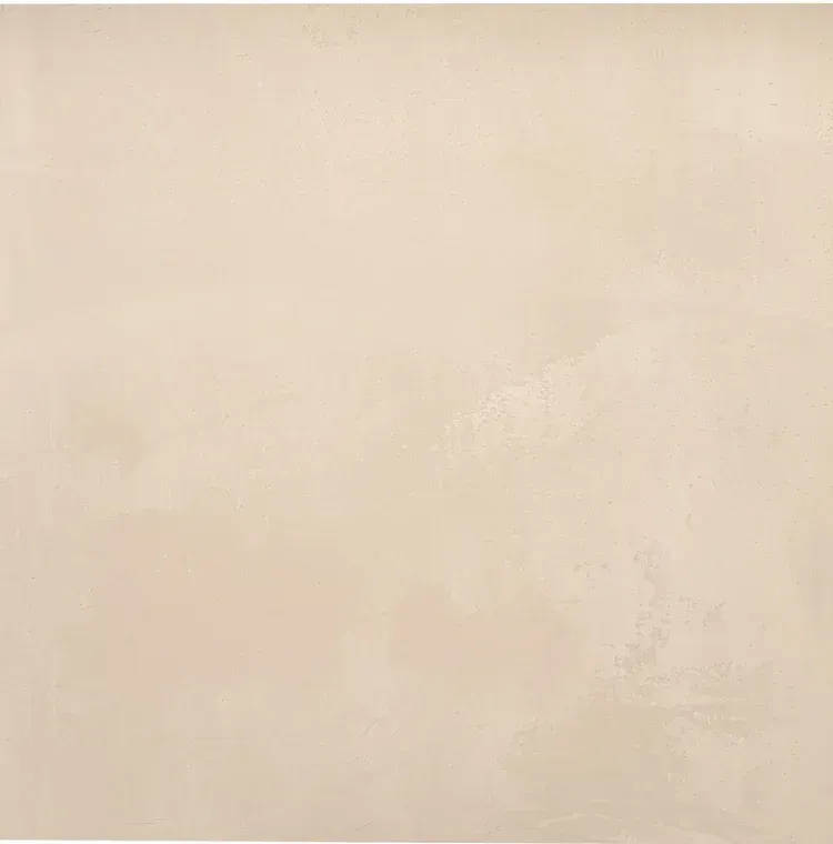 Beige wall with subtle, mottled texture.