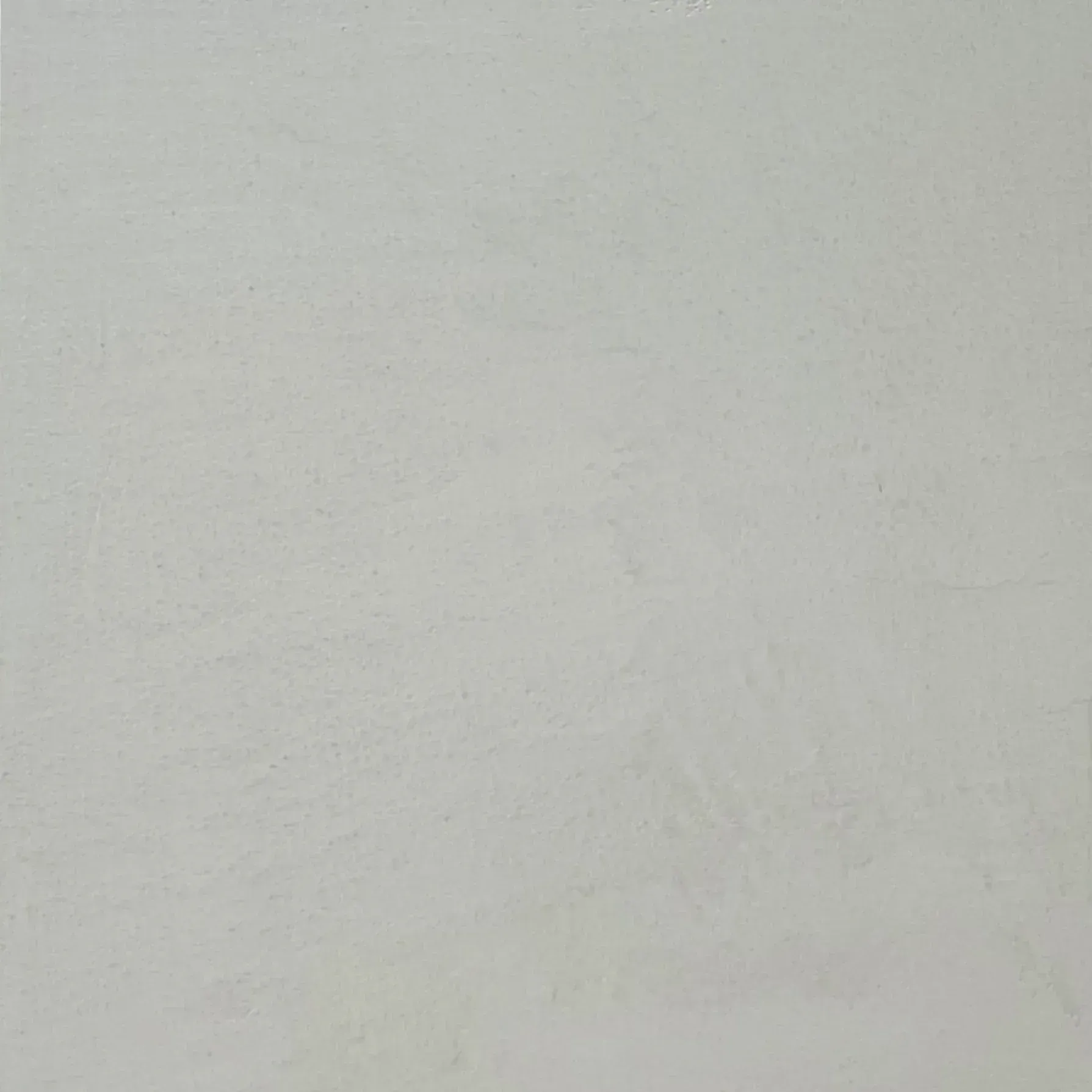 Blank off-white textured surface with faint smudges and subtle shadows