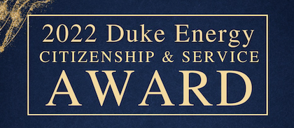 A blue sign that says 2022 duke energy citizenship and service award