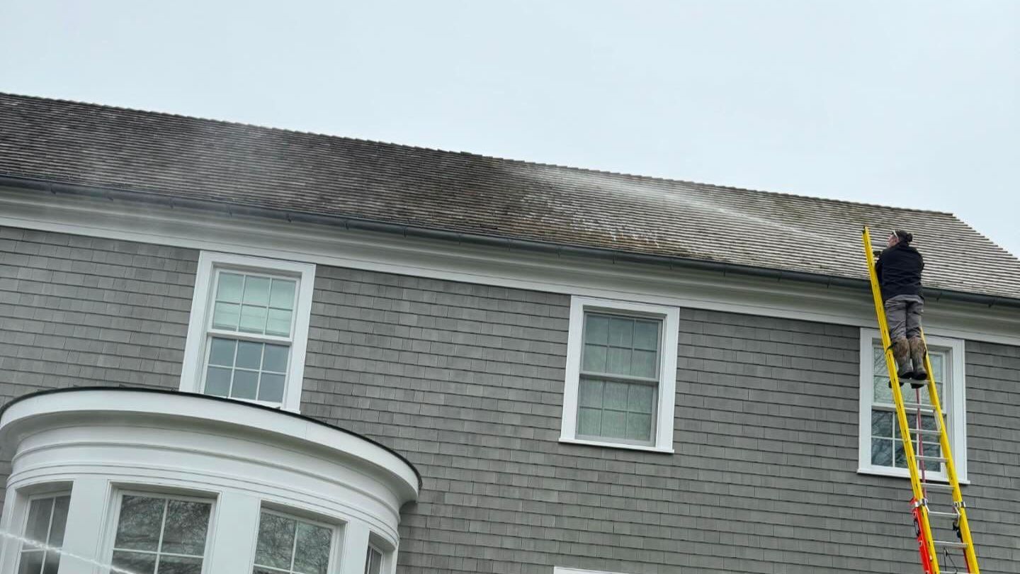 Roof Cleaning Services in Suffolk County remove mold, algae, dirt.