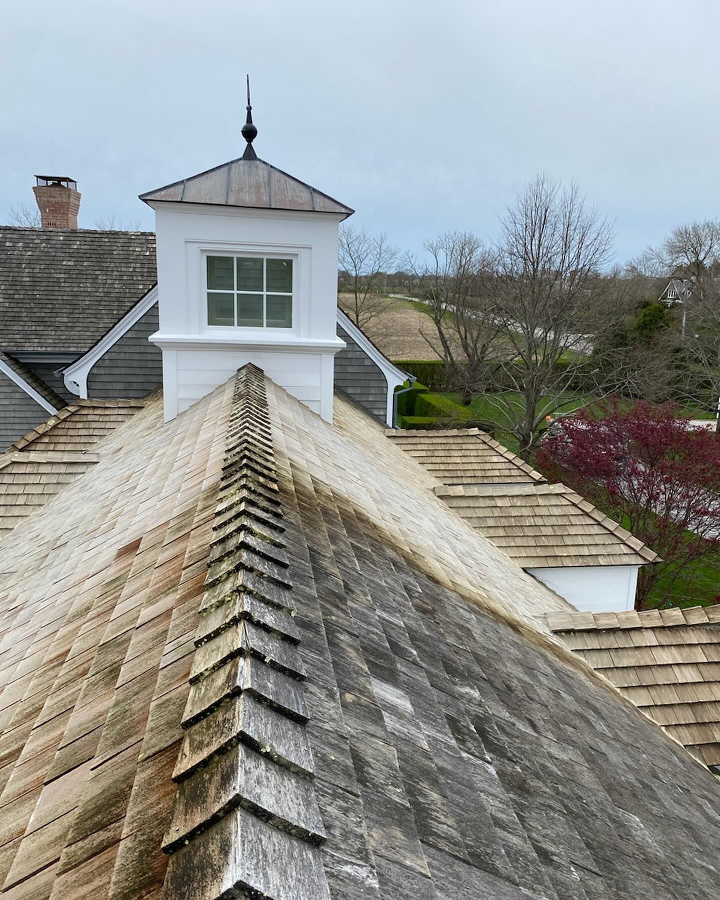 Cedar shake roof getting soft wash cleaning on Long Island 