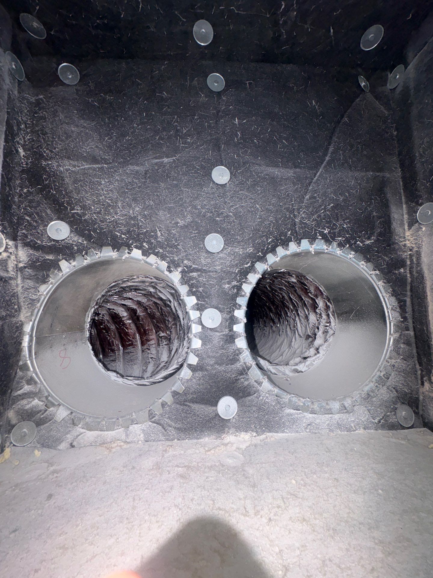 HVAC air duct with visible dirt and dust at a home in Westhampton Beach NY