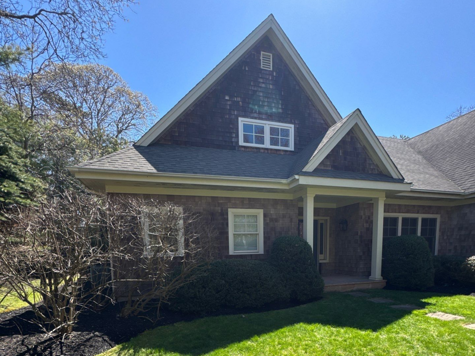 Home in Westhampton NY before soft washing of cedar shake siding