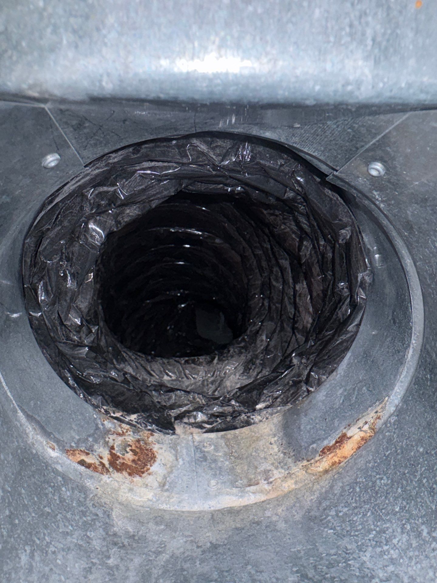 HVAC air duct with visible dirt and dust at a home in Westhampton Beach NY