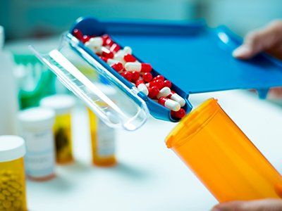 Pill Bottle With Capsules — Calhoun, GA — The Prescription Shop