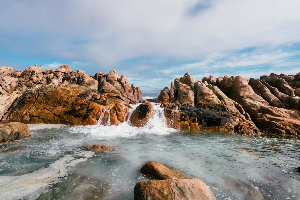 Waves Crashing Over Rocks — Refrigeration & Air Conditioning in Nambucca, NSW