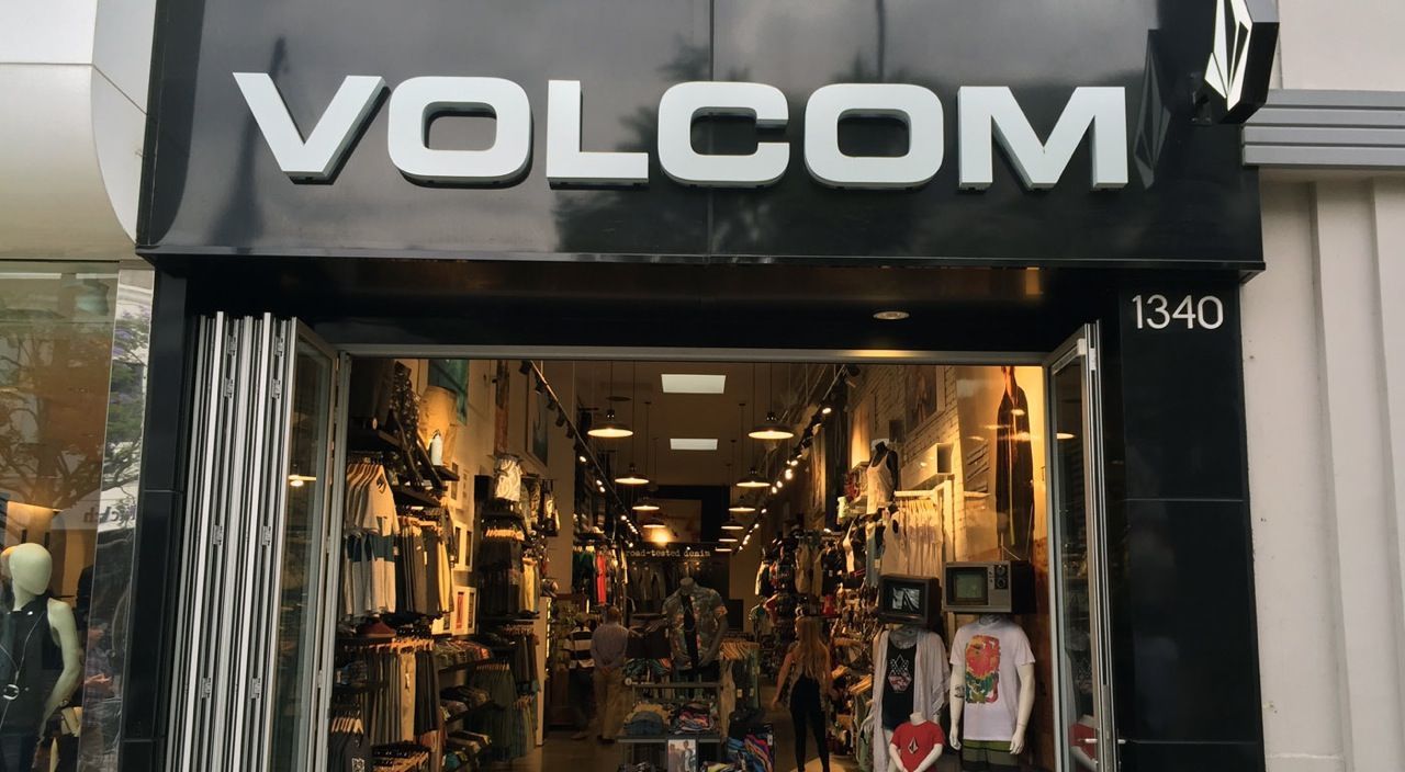 VOLCOM storefront with open entrance and surfboards visible inside