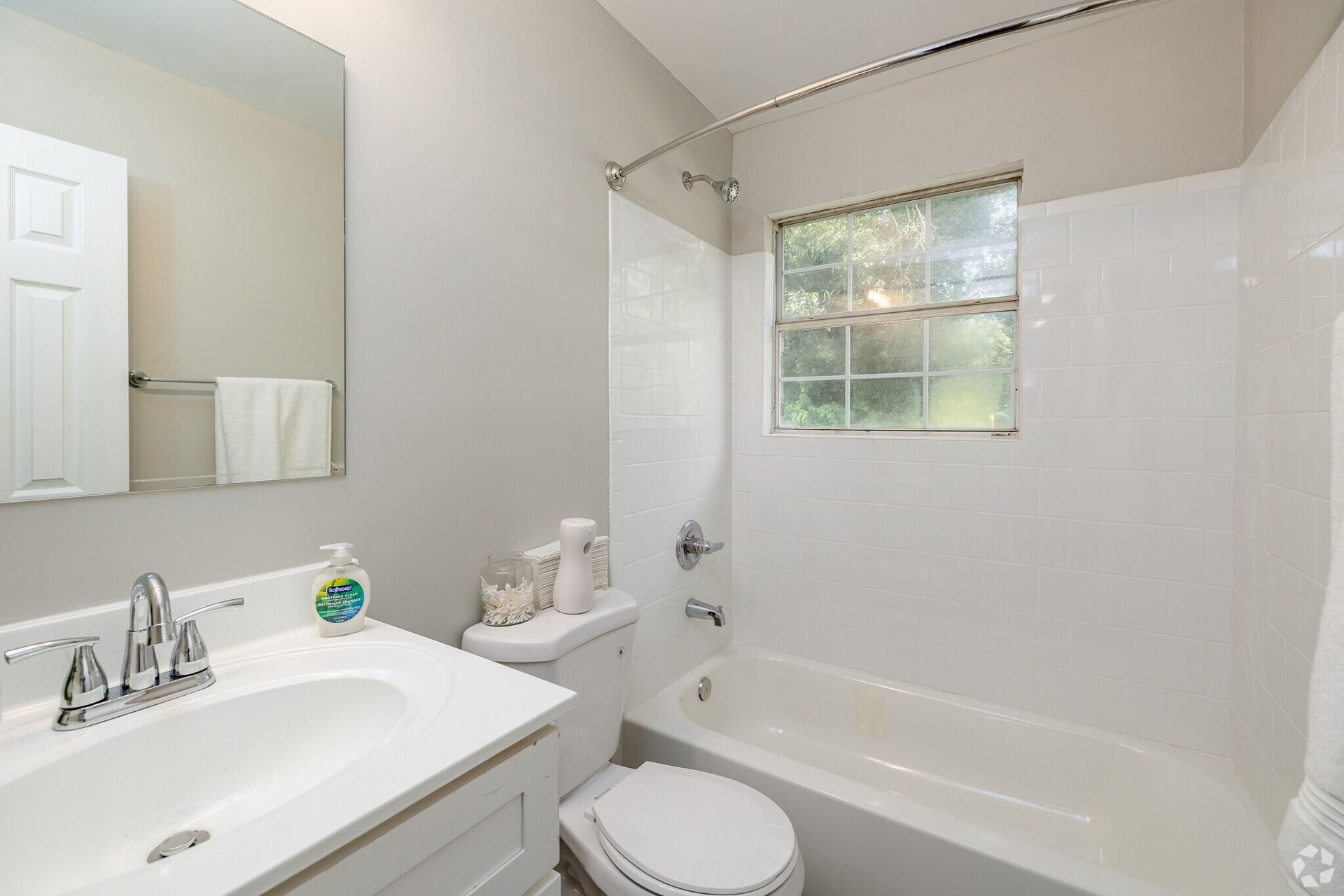 Photo of a bathroom with a shower/tub combo