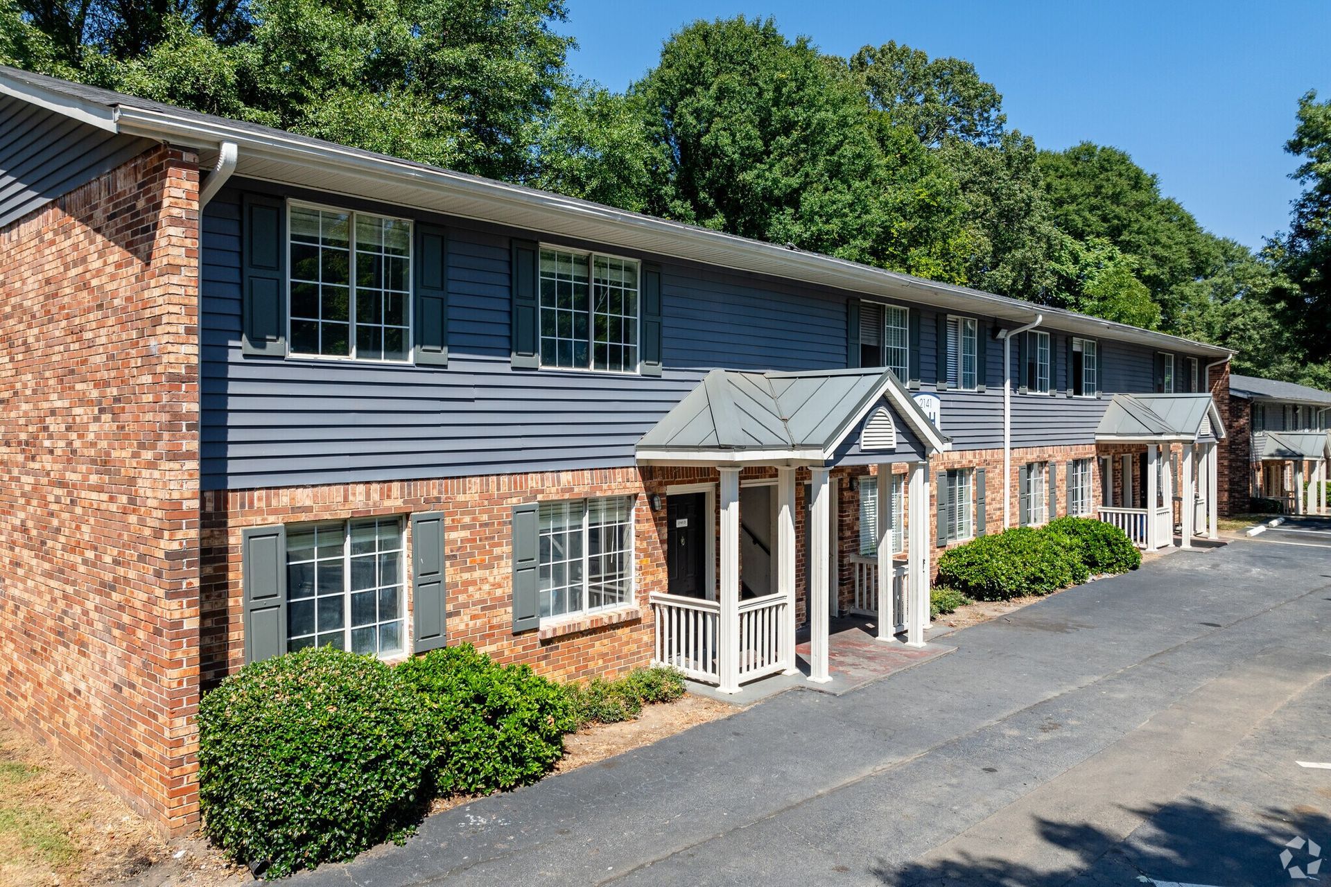 Photo of an apartment building showing the entrance to the building