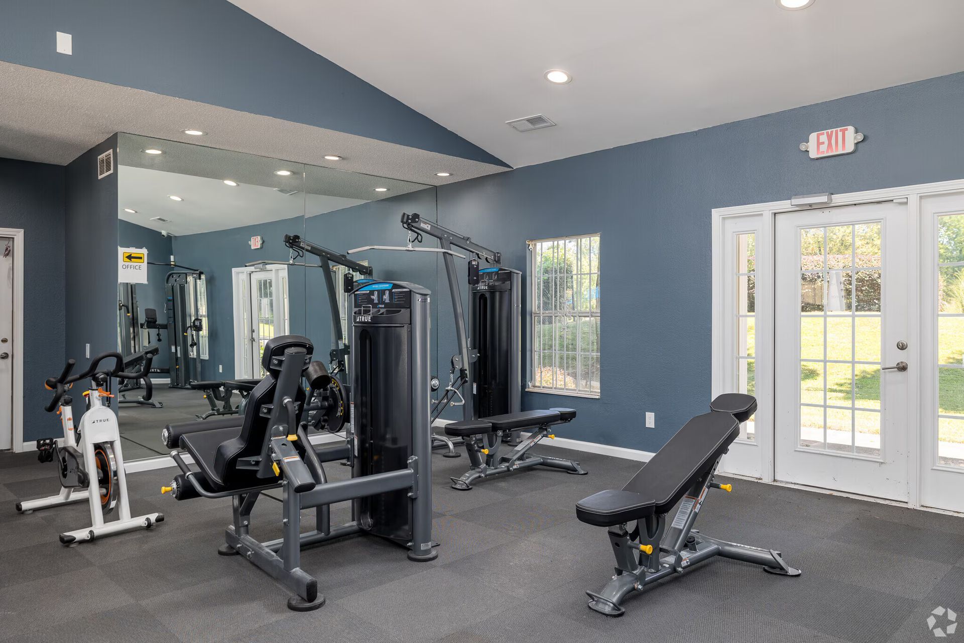Photo of the fitness center showing various types of machinery