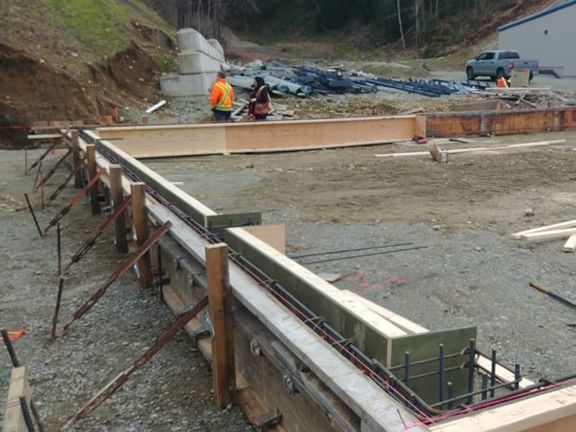 A group of people are working on a construction site