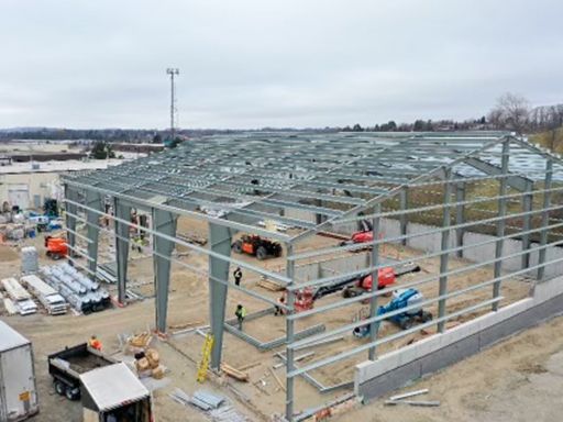 An aerial view of a building under construction.