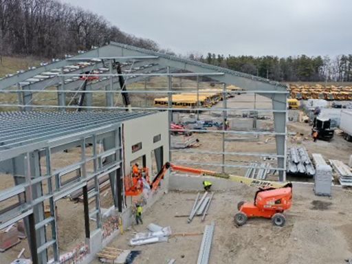 An aerial view of a building under construction.