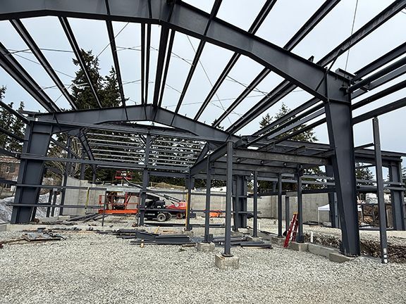Structural steel frames being added for a mezzanine in construction site on Salt Spring Island.