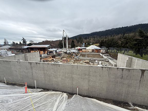 Concrete foundation walls provide strength and support against shifting soils and water runoff.
