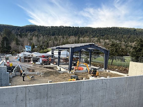 View of Double Black Construction site at Salt Spring Island where they are installing a pre-engineered metal building.