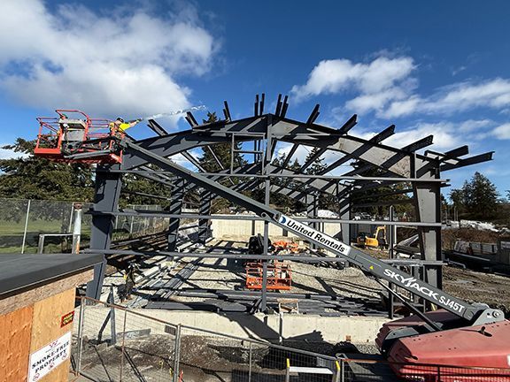 More steel framing being added to a warehousing structure on Salt Spring Island, BC.