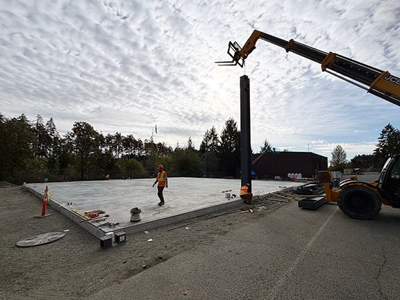 First steel framing beam erected on site in Nanaimo for VMAC.