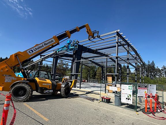 Closeup look at primary steel wall framing for metal building.
