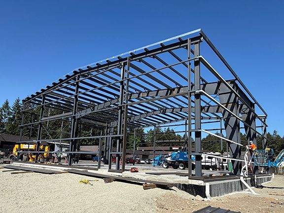 I-beam frame with roofing crossbeams at steel building construction site