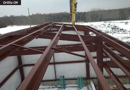 A picture of a metal structure with the word drillie on the bottom