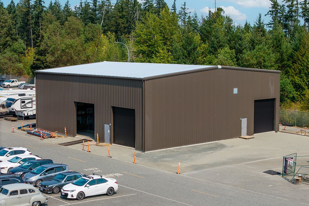 Brown metal building erected by Double Black Construction