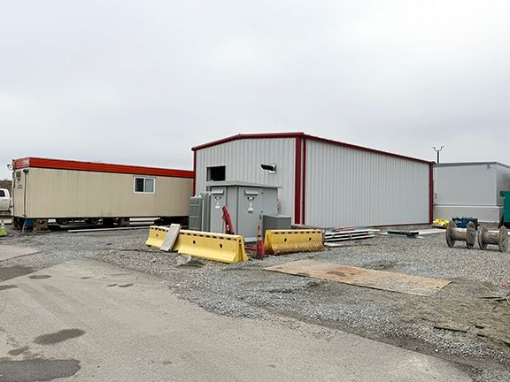 Profile view of the completed pre-engineered building that serves as a jet fuel pump house.
