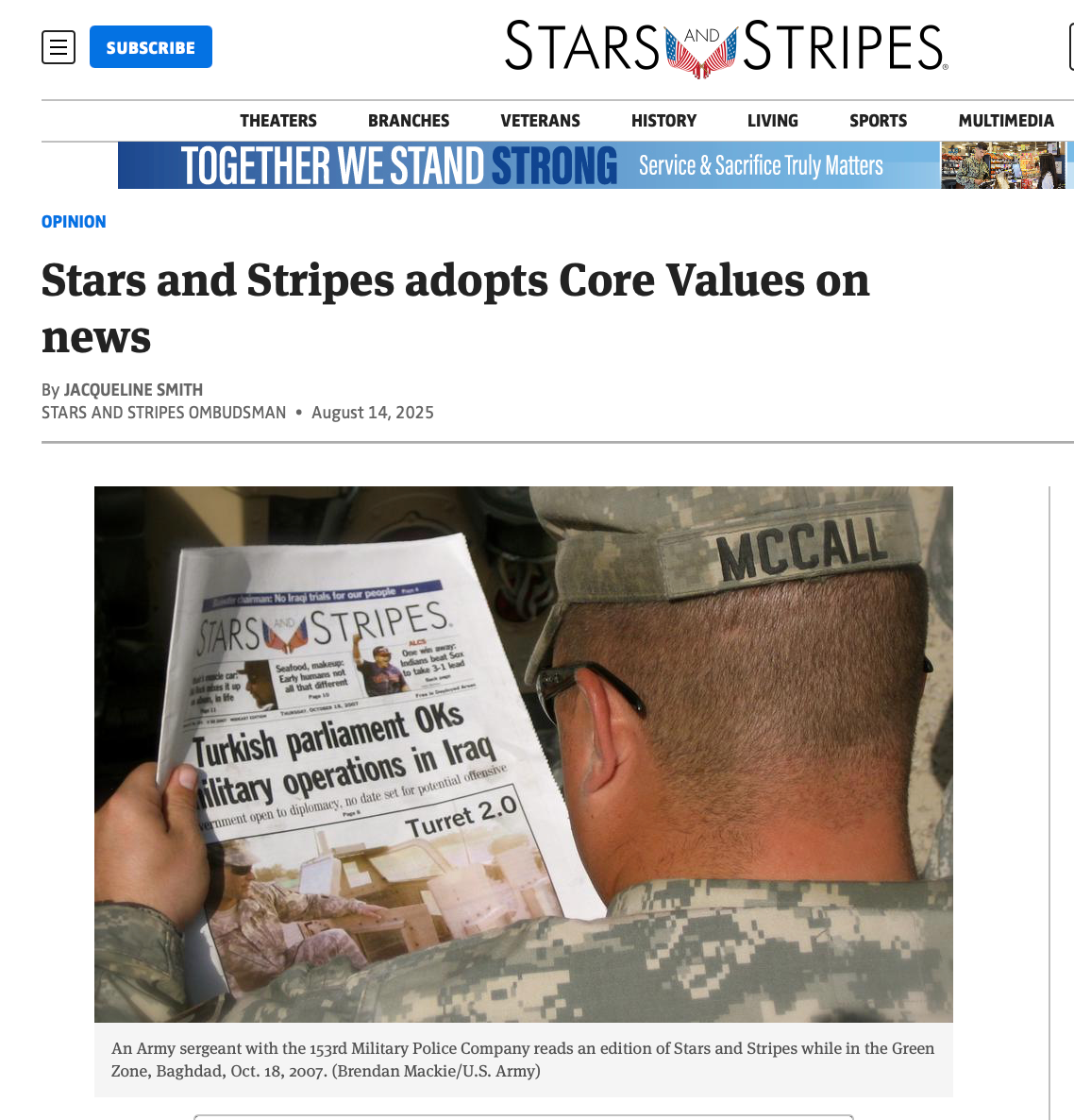 Soldier reading a Stars and Stripes newspaper