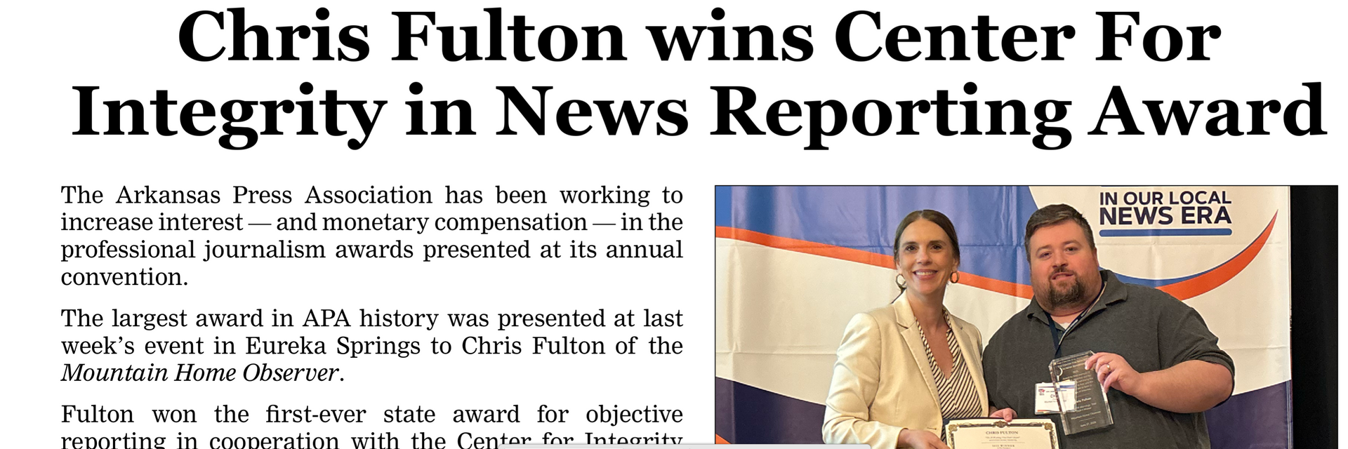 Chris Fulton receives the Center for Integrity in News Reporting Award on a newspaper page.
