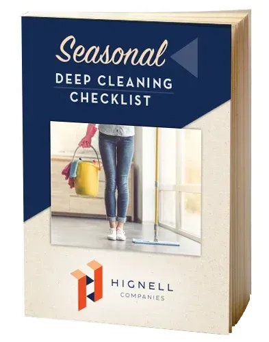 A book titled seasonal deep cleaning checklist with a woman holding a mop and bucket.