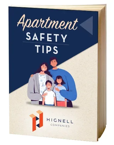 A book titled apartment safety tips with a family on the cover.