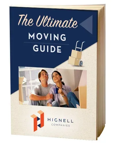 A book titled the ultimate moving guide has a picture of a man and woman on the cover.