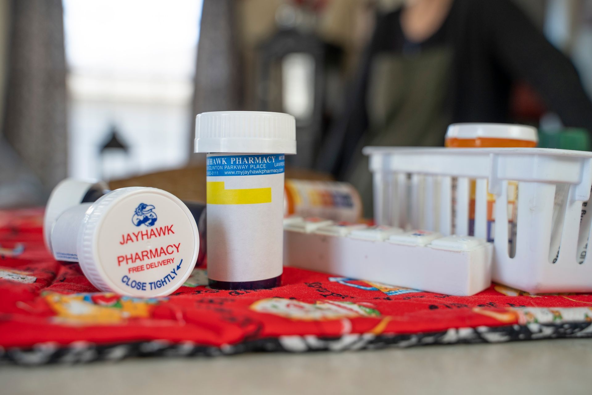 Professional advertisement for Jayhawk Pharmacy.