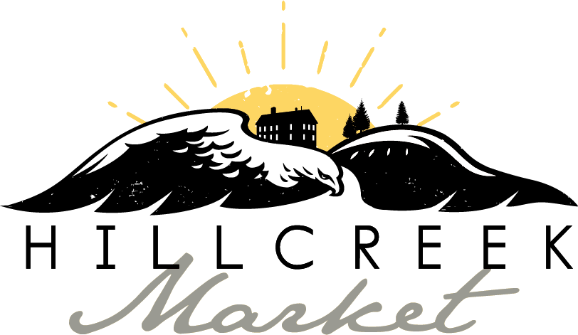the logo for hill creek market shows a bird flying over a mountain with a house in the background .