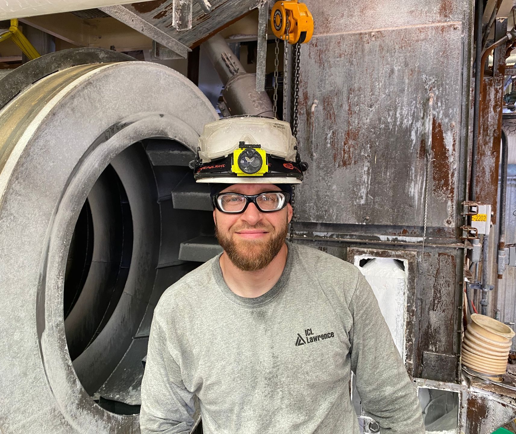 Professional advertisement of man working in a factory that was taken by KMG.