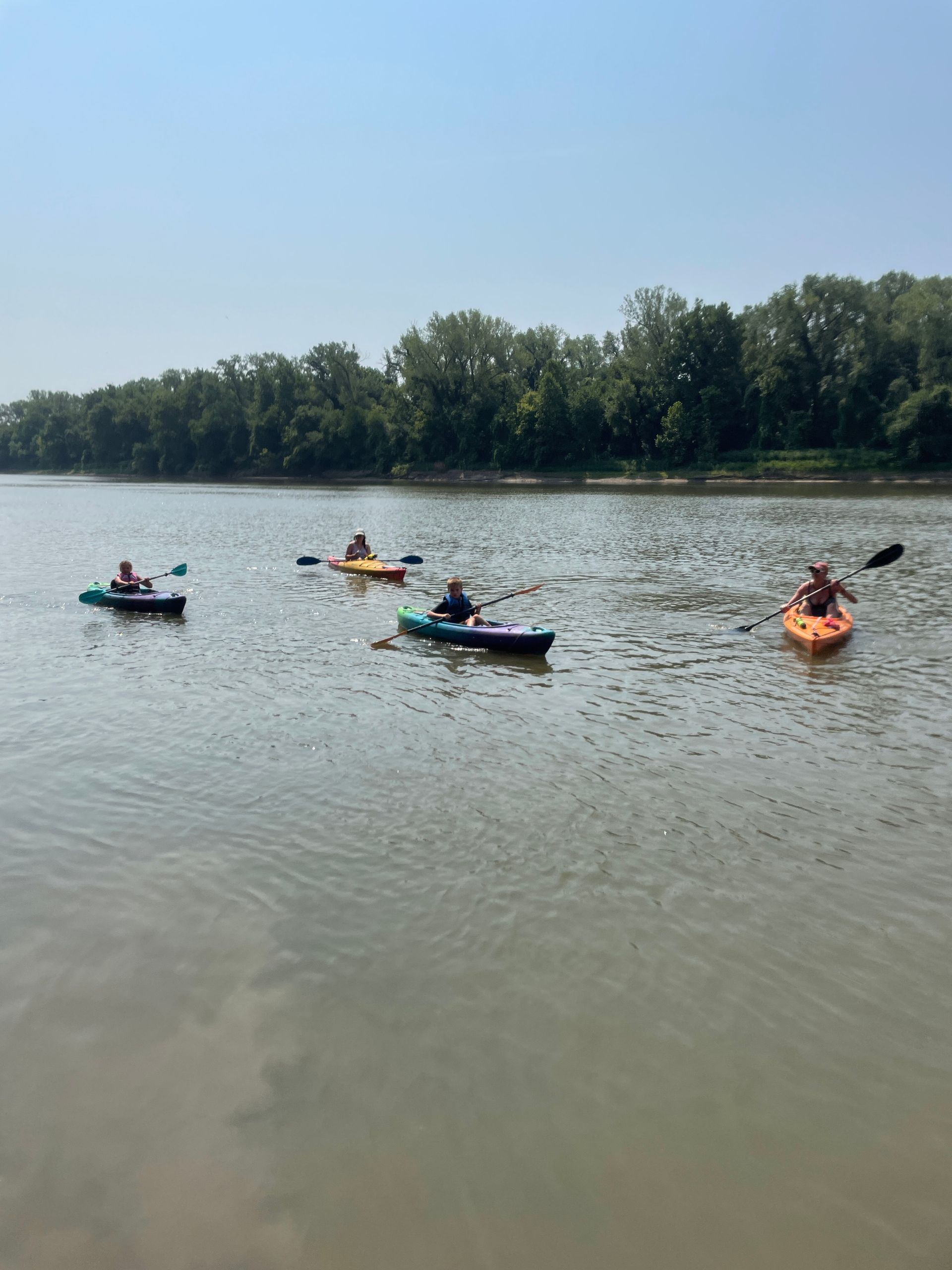 Professional photograph of people canoeing.