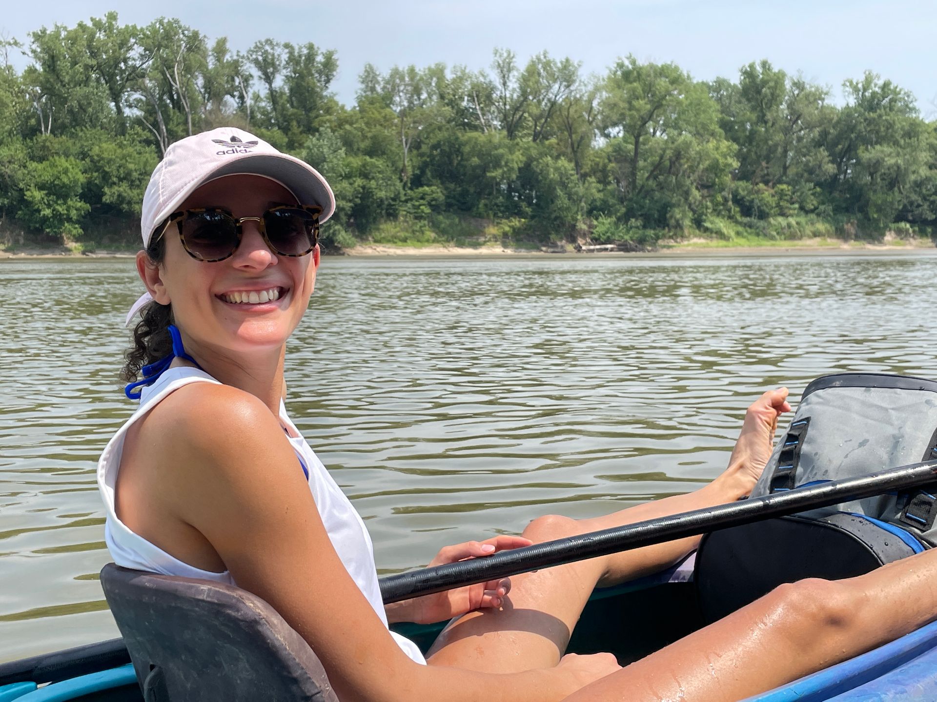 Professional photograph of a woman in a canoe.
