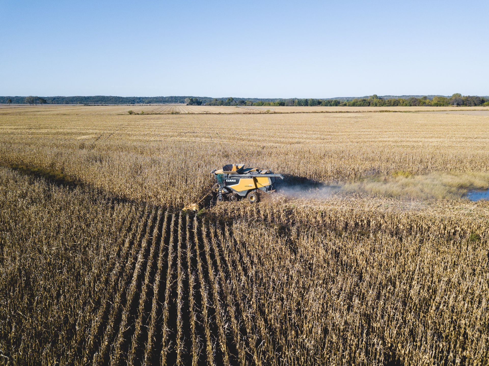 Drone photograph of wheat fields being harvested taken by KMG.