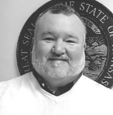 professional photograph of a man smiling