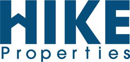 the logo for hike properties is blue and white .
