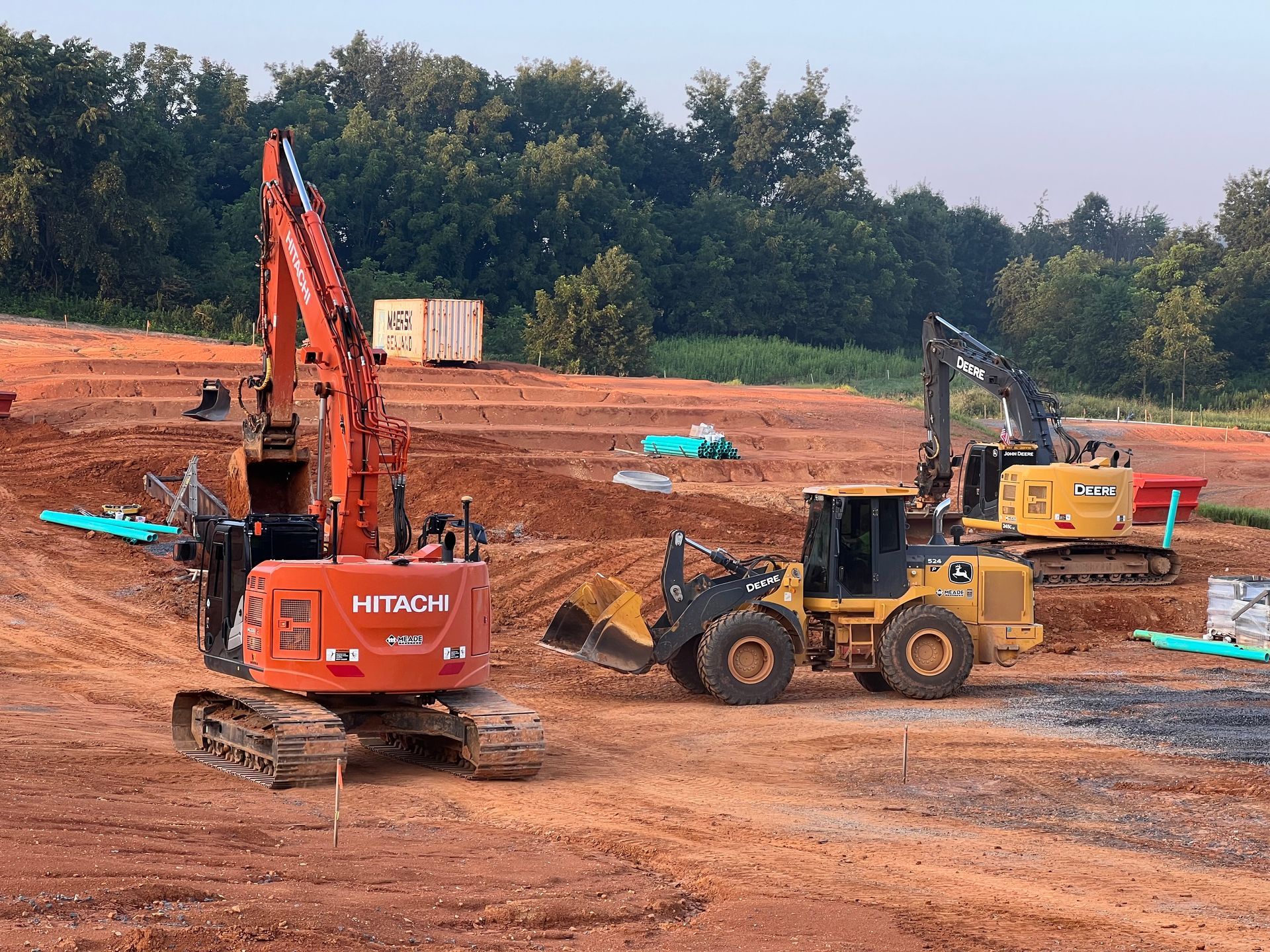 KZ Construction Team Members operating heavy machinery